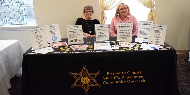 Becky and Liisa working a community outreach event.